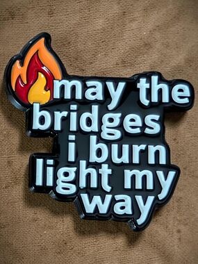 Black Enamel 'May the Bridges I Burn Light My Way' Brooch with Flame Accent